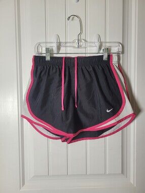 Nike Dri-fit Women’s Black Athletic Shorts with Pink Trim and White Panels.